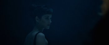 Movie still from “Nine” (2009), directed by Rob Marshall – A woman in a black dress is looking at the camera; Close Up shot, High angle