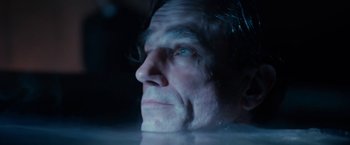 Movie still from “Nine” (2009), directed by Rob Marshall – A person's face with water in the background; Close Up shot, High angle