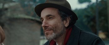 Movie still from “Nine” (2009), directed by Rob Marshall – A person wearing a hat; Close Up shot, Low angle