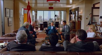 Movie still from “Nine Lives” (2016), directed by Barry Sonnenfeld – A group of people sitting in a living room; Wide shot, Over the shoulder angle