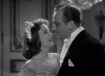 Movie still from “Ninotchka” (1939), directed by Ernst Lubitsch – A man and a woman are kissing in front of a mirror; Close Up shot, Low angle