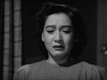 Movie still from “No Regrets for Our Youth” (1946), directed by Akira Kurosawa – An old photo of a woman crying with her eyes closed; Close Up shot, Low angle