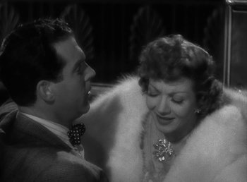 Movie still from “No Time for Love” (1943), directed by Mitchell Leisen – A man and a woman talking to each other; Close Up shot, Over the shoulder angle