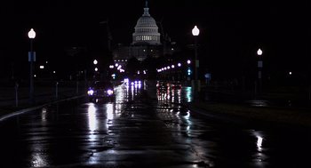 Movie still from “No Way Out” (1987), directed by Roger Donaldson – The capitol building is lit up at night; Extreme Wide shot, Low angle