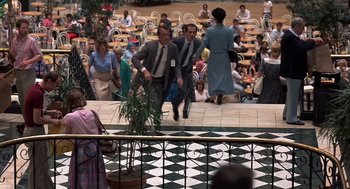 Movie still from “No Way Out” (1987), directed by Roger Donaldson – A group of people standing on top of a building; Wide shot, High angle