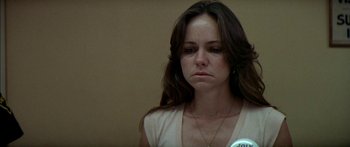 Movie still from “Norma Rae” (1979), directed by Martin Ritt – A person wearing a white shirt; Close Up shot, Low angle