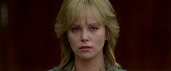 Movie still from “North Country” (2005), directed by Niki Caro – A person wearing a shirt; Close Up shot, Over the shoulder angle