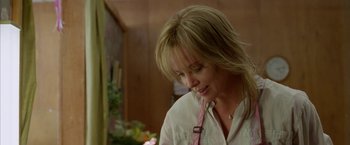 Movie still from “North Country” (2005), directed by Niki Caro – A person wearing a white shirt; Close Up shot, Over the shoulder angle