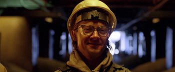 Movie still from “North Country” (2005), directed by Niki Caro – A man wearing glasses and a hard hat; Close Up shot, Low angle