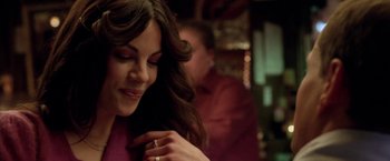 Movie still from “North Country” (2005), directed by Niki Caro – A person with a ring on her finger; Close Up shot, Over the shoulder angle