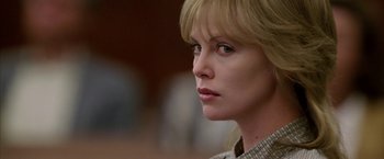 Movie still from “North Country” (2005), directed by Niki Caro – Charlize theron in the movie young adult; Close Up shot, Over the shoulder angle