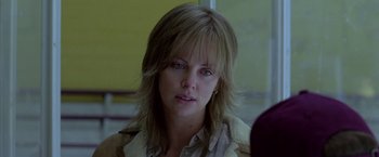 Movie still from “North Country” (2005), directed by Niki Caro – A person with long hair; Close Up shot, Over the shoulder angle