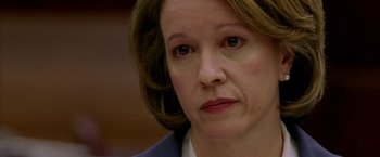 Movie still from “North Country” (2005), directed by Niki Caro – A woman's face as she stares into the distance; Close Up shot, Low angle