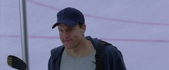 Movie still from “North Country” (2005), directed by Niki Caro – A person wearing a hat and a backpack; Close Up shot, Low angle