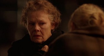 Movie still from “Notes on a Scandal” (2006), directed by Richard Eyre – An older woman looking at a younger woman; Close Up shot, Over the shoulder angle