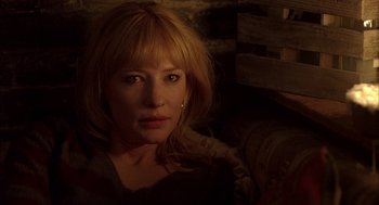 Movie still from “Notes on a Scandal” (2006), directed by Richard Eyre – A person with blonde hair; Close Up shot, Over the shoulder angle