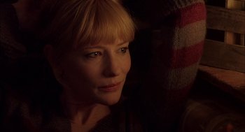 Movie still from “Notes on a Scandal” (2006), directed by Richard Eyre – A person with blond hair; Close Up shot, Over the shoulder angle