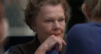 Movie still from “Notes on a Scandal” (2006), directed by Richard Eyre – An older woman sitting in front of a mirror; Close Up shot, Over the shoulder angle