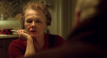 Movie still from “Notes on a Scandal” (2006), directed by Richard Eyre – An older woman sitting in front of a bathroom mirror; Close Up shot, Over the shoulder angle
