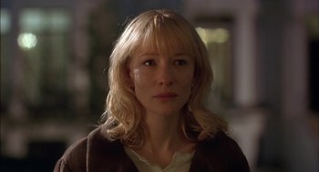 Movie still from “Notes on a Scandal” (2006), directed by Richard Eyre – A person wearing a jacket; Close Up shot, Over the shoulder angle