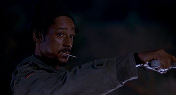 Movie still from “Nothing to Lose” (1997), directed by Steve Oedekerk – A man holding a cigarette in his mouth; Close Up shot, Low angle