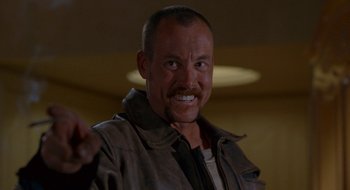 Movie still from “Nothing to Lose” (1997), directed by Steve Oedekerk – A person wearing a jacket; Close Up shot, Low angle