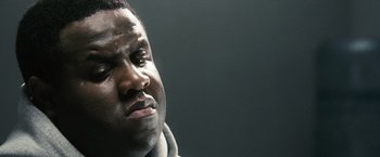 Movie still from “Notorious” (2009), directed by George Tillman Jr. – A person looking up at the sky; Close Up shot, Low angle