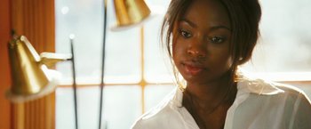 Movie still from “Notorious” (2009), directed by George Tillman Jr. – A person wearing a white shirt; Close Up shot, Over the shoulder angle