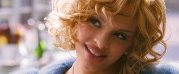 Movie still from “Notorious” (2009), directed by George Tillman Jr. – A woman with blonde hair; Close Up shot, High angle