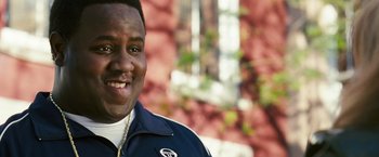 Movie still from “Notorious” (2009), directed by George Tillman Jr. – A person wearing a jacket; Close Up shot, High angle