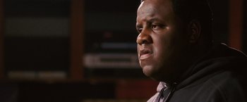 Movie still from “Notorious” (2009), directed by George Tillman Jr. – A person with his eyes wide open; Close Up shot, Low angle