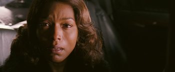 Movie still from “Notorious” (2009), directed by George Tillman Jr. – A woman's face in the dark; Close Up shot, Overhead angle