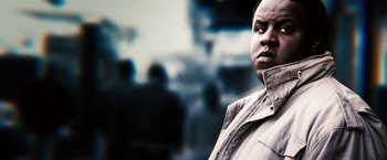 Movie still from “Notorious” (2009), directed by George Tillman Jr. – A person wearing a jacket; Close Up shot, Low angle