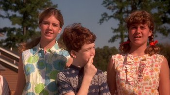 Movie still from “Now and Then” (1995), directed by Lesli Linka Glatter – A group of young people standing next to each other; Medium shot, Low angle