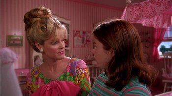 Movie still from “Now and Then” (1995), directed by Lesli Linka Glatter – Two young women talking to each other in a pink room; Medium shot, Over the shoulder angle
