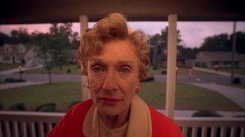 Movie still from “Now and Then” (1995), directed by Lesli Linka Glatter – An older woman is looking into the camera; Close Up shot, Low angle