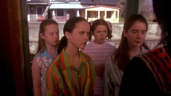 Movie still from “Now and Then” (1995), directed by Lesli Linka Glatter – A group of young people standing next to each other; Medium shot, High angle