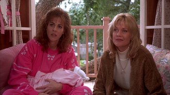 Movie still from “Now and Then” (1995), directed by Lesli Linka Glatter – Two women sitting next to each other on a porch; Medium shot, Over the shoulder angle