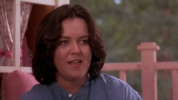 Movie still from “Now and Then” (1995), directed by Lesli Linka Glatter – A person wearing a blue shirt; Close Up shot, Over the shoulder angle