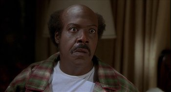 Movie still from “Nutty Professor II: The Klumps” (2000), directed by Peter Segal – A person wearing a shirt; Close Up shot, High angle