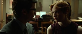 Movie still from “Oculus” (2013), directed by Mike Flanagan – A man and a woman talking to each other; Close Up shot, Over the shoulder angle
