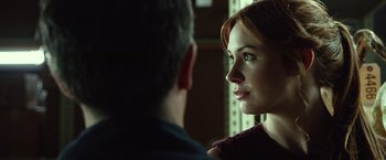 Movie still from “Oculus” (2013), directed by Mike Flanagan – A man and a woman are looking at one another; Close Up shot, Over the shoulder angle