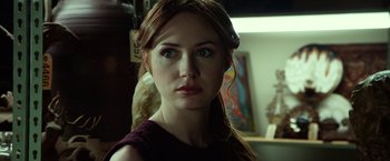 Movie still from “Oculus” (2013), directed by Mike Flanagan – A person with long red hair; Close Up shot, Over the shoulder angle