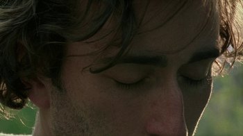 Movie still from “Old Joy” (2006), directed by Kelly Reichardt – A man's face with his eyes closed; Extreme Close Up shot, High angle