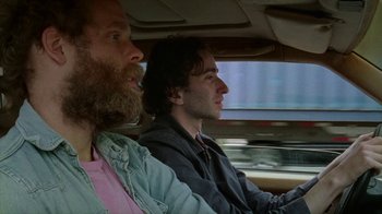 Movie still from “Old Joy” (2006), directed by Kelly Reichardt – Two men sitting in the drivers seat of a car; Close Up shot, Over the shoulder angle