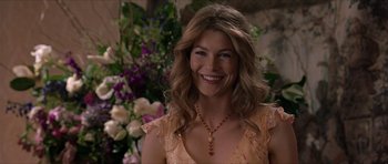 Movie still from “Old School” (2003), directed by Todd Phillips – A woman with long blonde hair wearing a yellow dress; Close Up shot, Over the shoulder angle