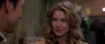 Movie still from “Old School” (2003), directed by Todd Phillips – A person with long brown hair; Close Up shot, Over the shoulder angle