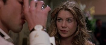 Movie still from “Old School” (2003), directed by Todd Phillips – A person holding a hand; Close Up shot, Over the shoulder angle