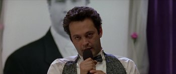 Movie still from “Old School” (2003), directed by Todd Phillips – A person holding a piece of chocolate cake; Close Up shot, Low angle