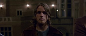 Movie still from “Old School” (2003), directed by Todd Phillips – A person with long hair; Close Up shot, Low angle